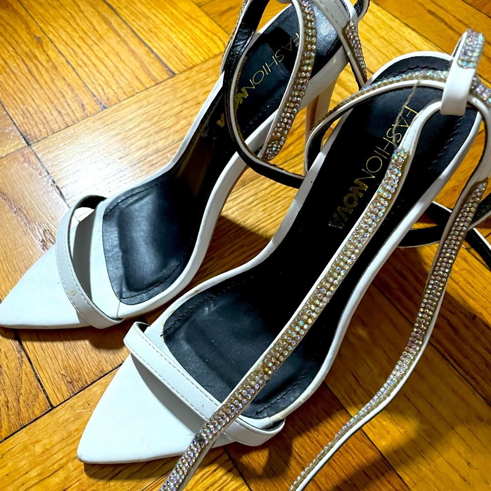 White pointy lace up heels